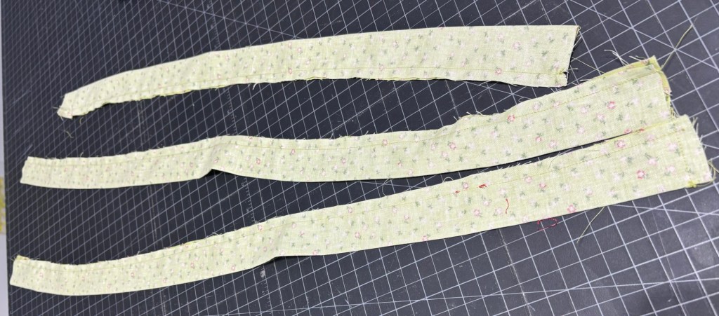 Neck band and apron ties