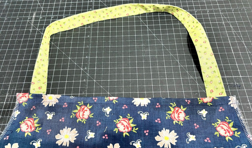 sewed neck band to apron